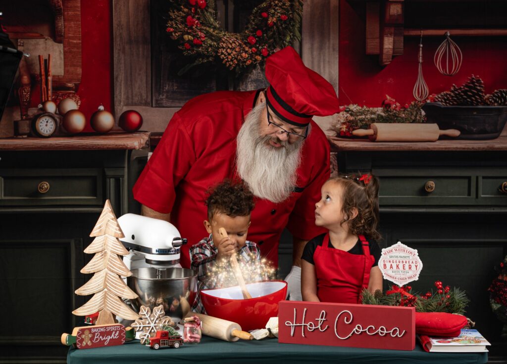 santa baking christmas cookies with children